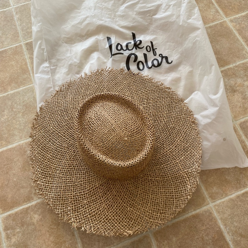 Lack of color frayed boater hat